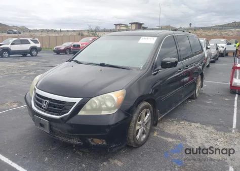 2010 Honda Odyssey Touring из США, поврежденный, VIN 5FNRL3H92AB084702